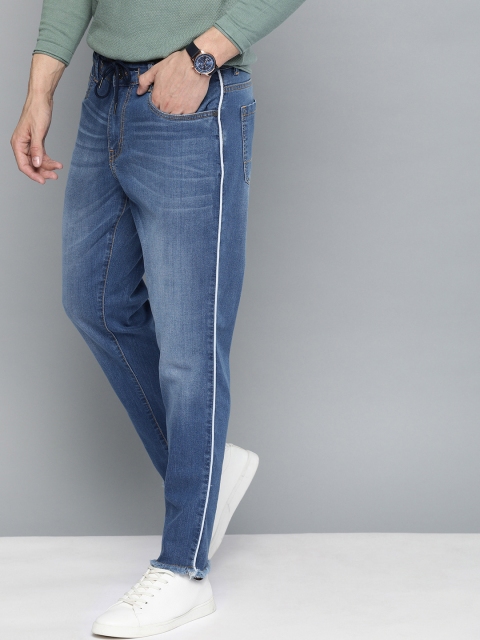 

Mast & Harbour Men Blue Carrot Fit Mid-Rise Clean Look Stretchable Jeans