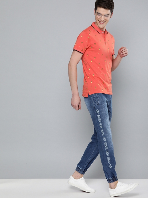 

Mast & Harbour Men Blue Jogger Mid-Rise Clean Look Stretchable Jeans With Printed Detail