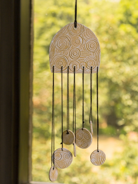 

ExclusiveLane Yellow Curved Handmade & Hand-Painted Garden Decorative Hanging & Wind Chime