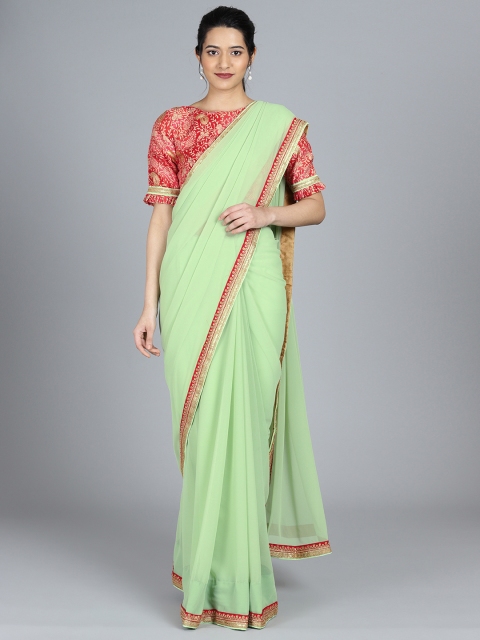 

Bollywood Vogue Green & Red Poly Georgette Solid Saree With Stitched Blouse