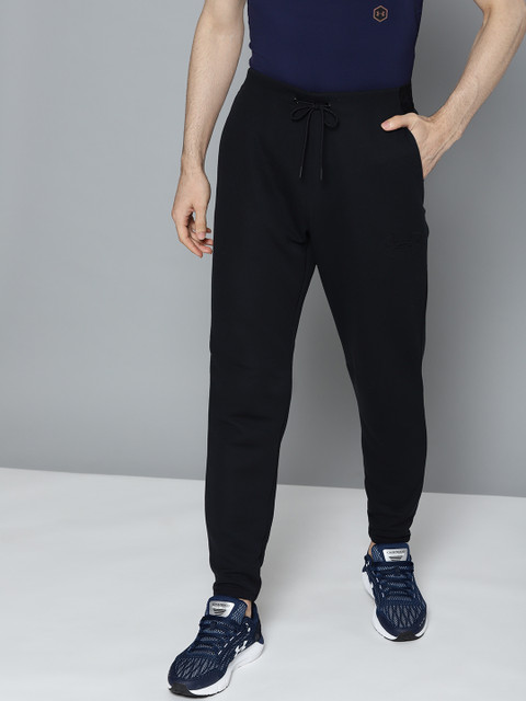 

UNDER ARMOUR Men Black Unstoppable Move Light Solid Trackpants