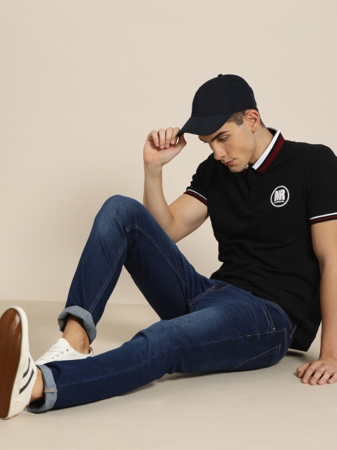 

Moda Rapido Men Black Solid Polo Collar T-shirt