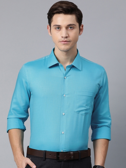 

Van Heusen Men Blue Solid Ourapress Smart Slim Fit Formal Shirt