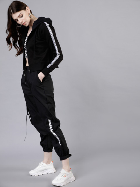 

Tokyo Talkies Women Black Solid Hooded Sweatshirt