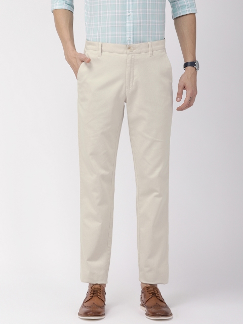 

Raymond Men Beige Slim Fit Self Design Regular Trousers