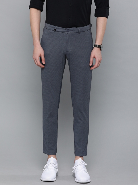 

Louis Philippe Ath.Work Men Blue Comfort Tapered Fit Self Design Formal Trousers