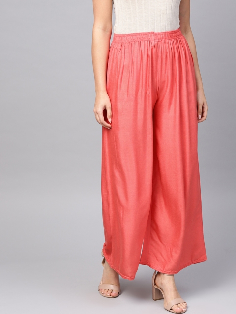 

PINKSKY Women Coral Pink Solid Straight Palazzos