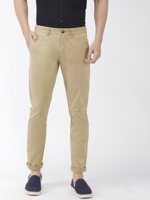 

Celio Men Beige Solid Slim Fit Regular Trousers