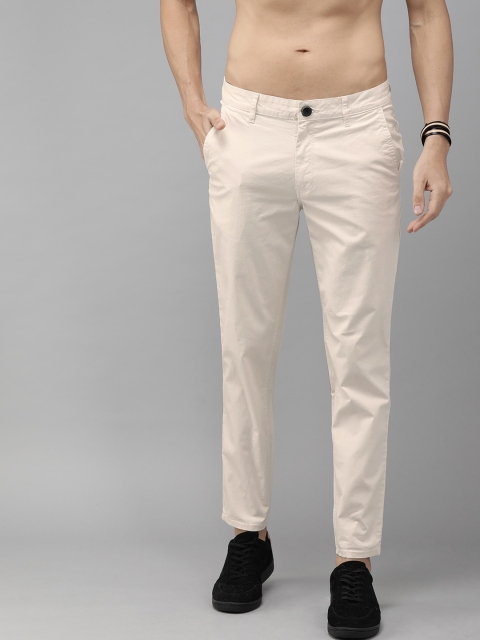 

The Roadster Lifestyle Co Men Cream-Coloured Tapered Fit Solid Regular Trousers