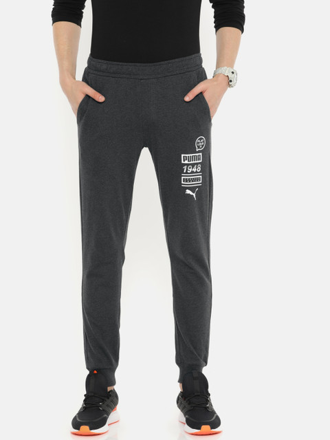 

Puma Men Charcoal Grey Solid Slim Fit Knittted Graphic cl Joggers