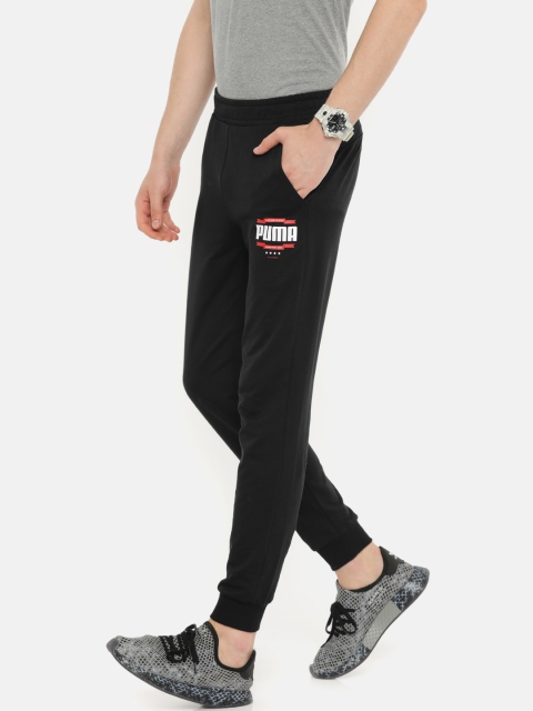 

Puma Men Black Solid Straight Fit Knitted Graphic Pants cl II Joggers