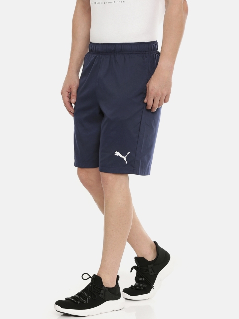 

Puma Men Navy Blue Solid dryCELL Active Woven Short 9" Regular Fit Sports Shorts