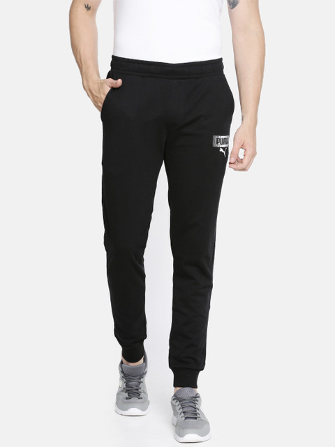 

Puma Men Black Solid Straight Fit Graphic Pants cl Joggers