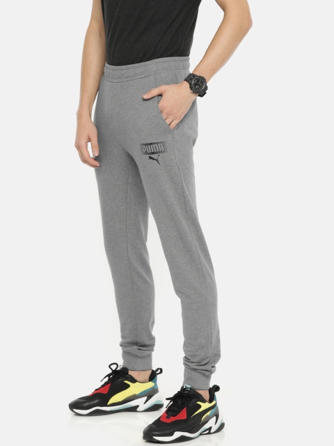 

Puma Men Grey Solid Straight Fit Knittted Graphic cl III Joggers