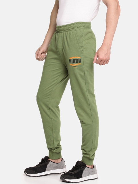 

Puma Men Olive Green Solid Slim Fit Knitted Graphic cl II Joggers