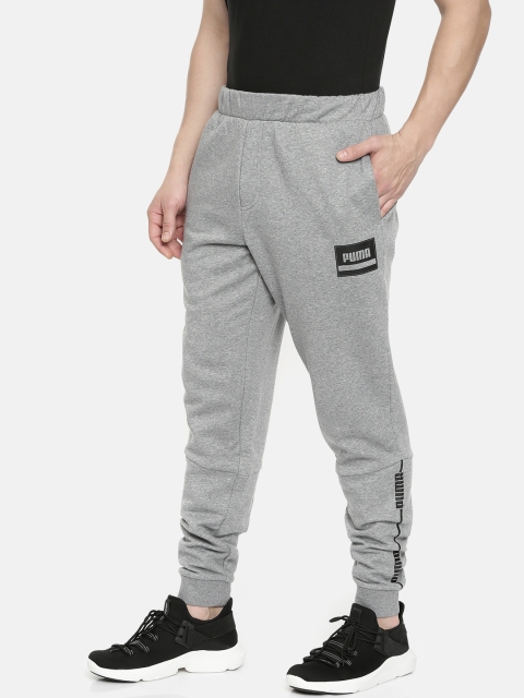 

Puma Men Grey Melange Solid Relaxed Fit Rebel Wire Pant CL Joggers