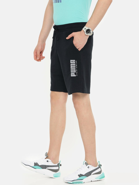 

Puma Men Black Solid Regular Fit Athletics TR 9" Sport Shorts