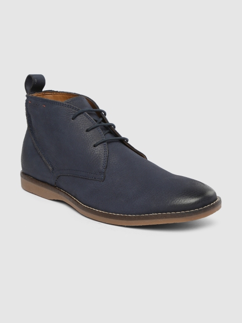 

Ruosh Men Navy Blue Solid Leather Mid-Top Flat Boots