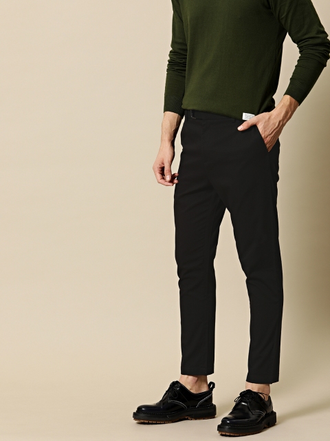 

Mr Bowerbird Men Black Tailored Fit Self Design Regular Trousers
