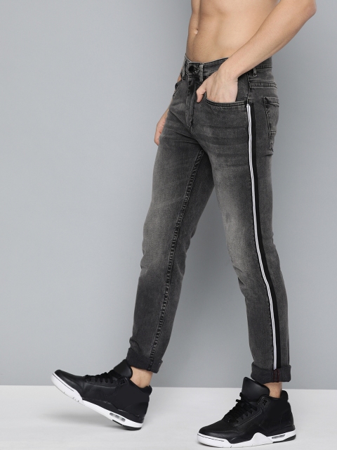 

HERE&NOW Men Black Slim Fit Mid-Rise Clean Look Side Striped Stretchable Jeans