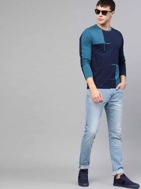 

Seven Rocks Men Blue Colourblocked Round Neck T-shirt