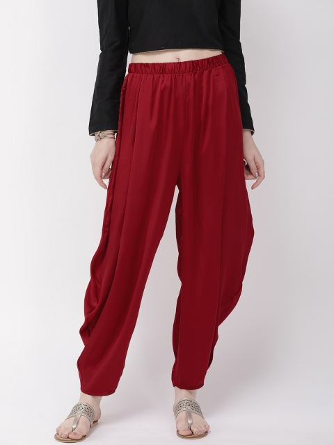 

Go Colors Women Maroon Solid Loose Fit Shiny Dhoti Pants