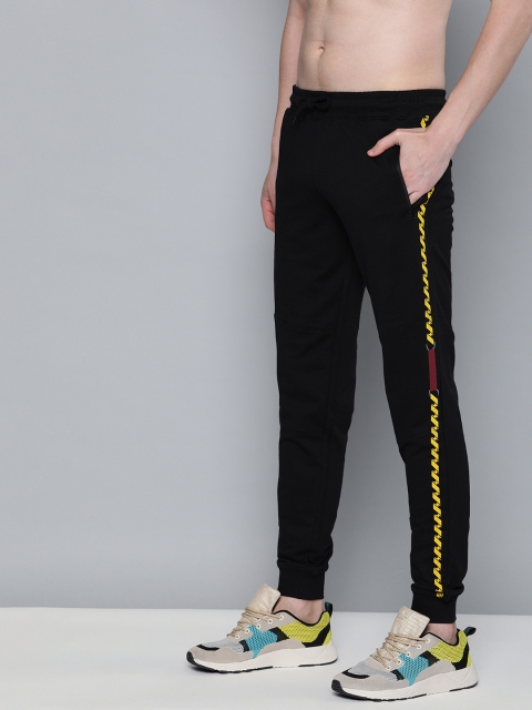 

HERE&NOW Men Black Solid Slim Fit Joggers With Print Detail