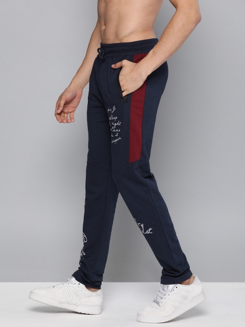 

HERE&NOW Men Navy Blue Solid Straight Fit Track Pants with Side Stripes