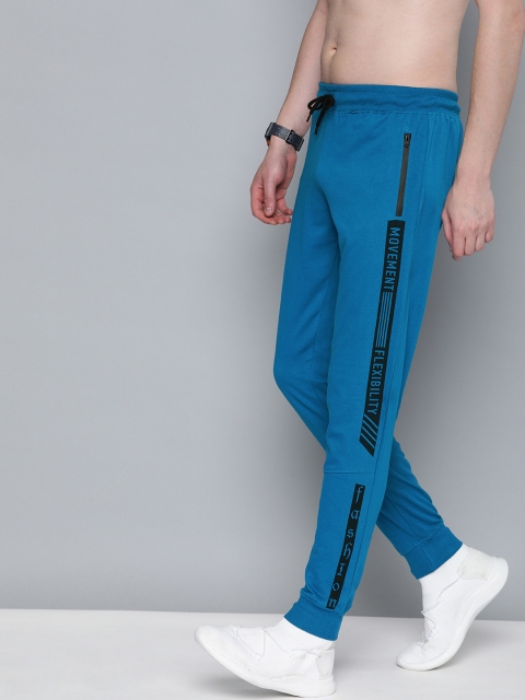 

HERE&NOW Men Blue Solid Slim Fit Joggers With Print Detail