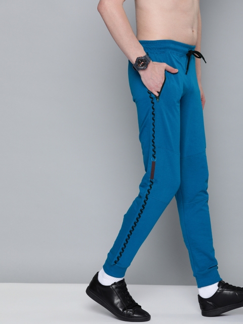 

HERE&NOW Men Blue Solid Slim Fit Joggers With Print Detail