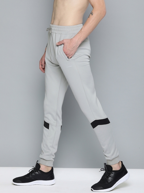 

HRX by Hrithik Roshan Grey Melange Slim Fit Solid Rapid-Dry Training Joggers