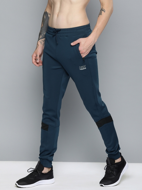 

HRX by Hrithik Roshan Men Teal Blue Slim Fit Solid Rapid-Dry Training Joggers