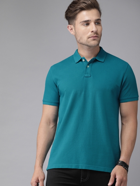 

Roadster Men Teal Blue Regular Fit Solid Polo Collar Tshirt