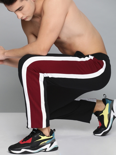 

HERE&NOW Men Black & Maroon Solid Straight Fit Track Pants with Side Stripes