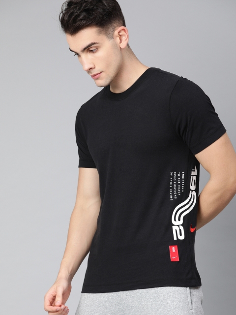 

Nike Men Black Solid Round Neck Dri-Fit T-shirt