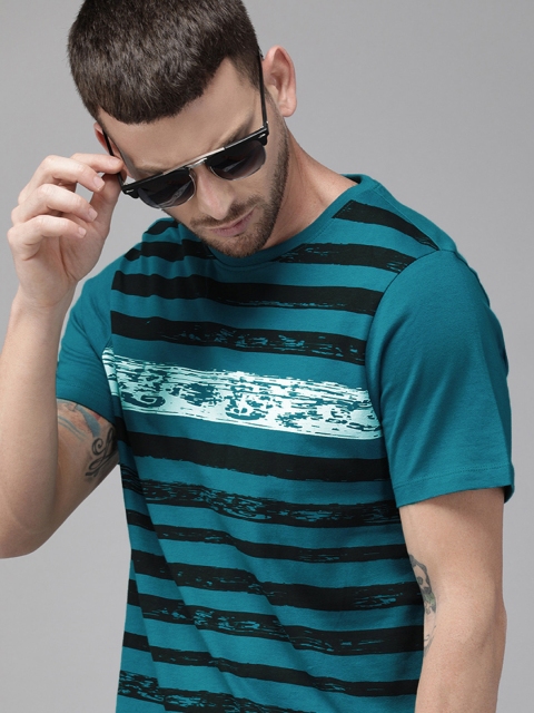 

Roadster Men Teal Blue & Black Striped Round Neck T-shirt