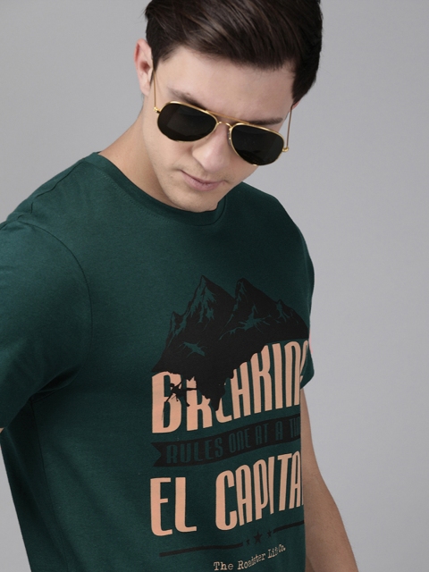 

The Roadster Lifestyle Co Men Green Graphic Printed Round Neck Pure Cotton T-shirt