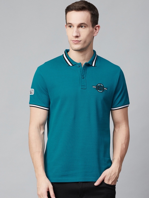 

Roadster Men Blue Solid Polo Collar T-shirt