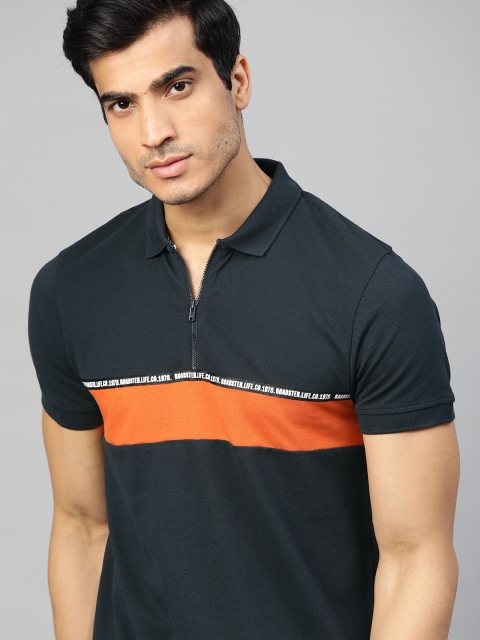 

Roadster Men Navy Blue & Rust Orange Solid Polo Collar T-shirt