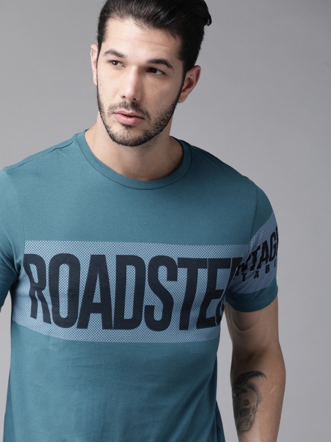 

The Roadster Lifestyle Co Men Teal Blue Printed Round Neck Pure Cotton T-shirt