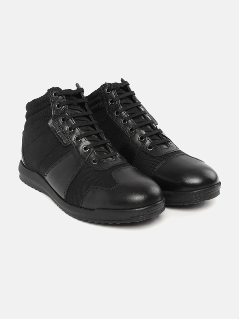 

Royal Enfield Men Black Solid Mid-Top Flat Boots