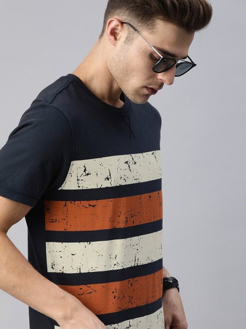 

Roadster Men Navy Blue & Orange Striped Round Neck T-shirt