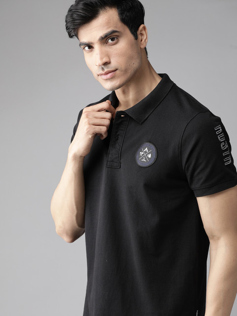 

Roadster Men Black Solid Polo Collar T-shirt