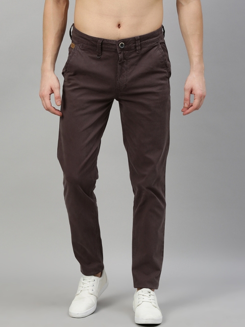 

The Roadster Lifestyle Co Men Brown Slim Fit Self Design Regular Trousers