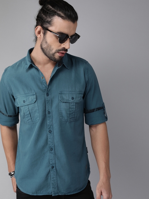 

Roadster Men Teal Blue Regular Fit Solid Casual Shirt