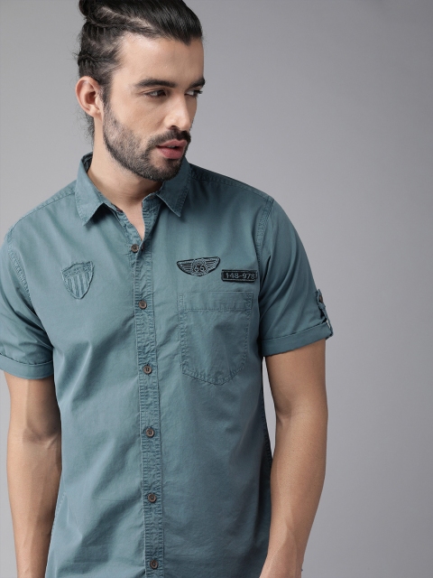 

Roadster Men Teal Blue Regular Fit Solid Casual Shirt with Applique Detail