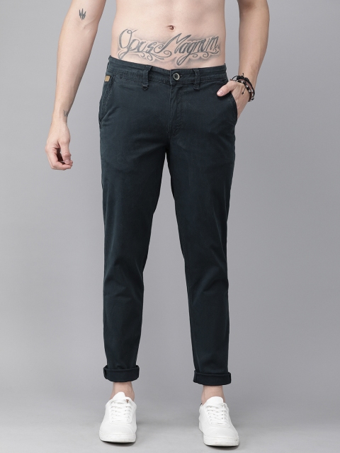 

Roadster Men Navy Blue Regular Fit Self Design Regular Trousers