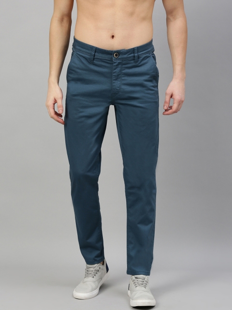 

The Roadster Lifestyle Co Men Teal Blue Tapered Fit Solid Regular Trousers