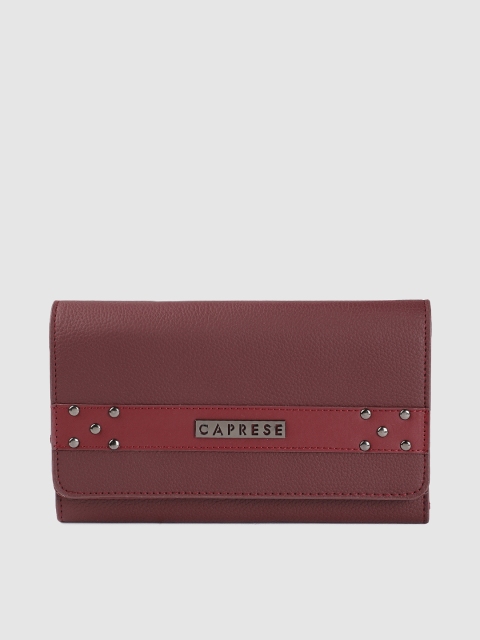 

Caprese Women Maroon Solid Three Fold Wallet