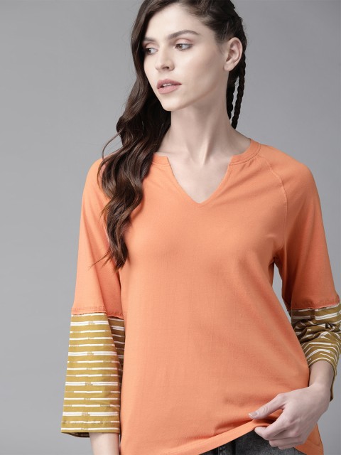 

Roadster Women Peach-Coloured Solid Round Neck T-shirt